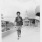 a woman walking on a bridge