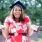 a girl wearing a graduation gown and cap